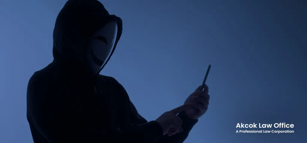 hacker in front of a blue background